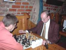 Audience hall. The same politician Ceslovas Jursenas playing blitz against Kestutis Miskinis - the vice-chairman of the Lithuanian agricultural department.